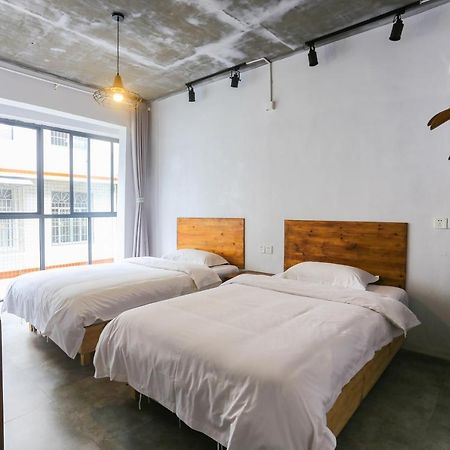 Hostel Geographer Zhangjiajie Buitenkant foto