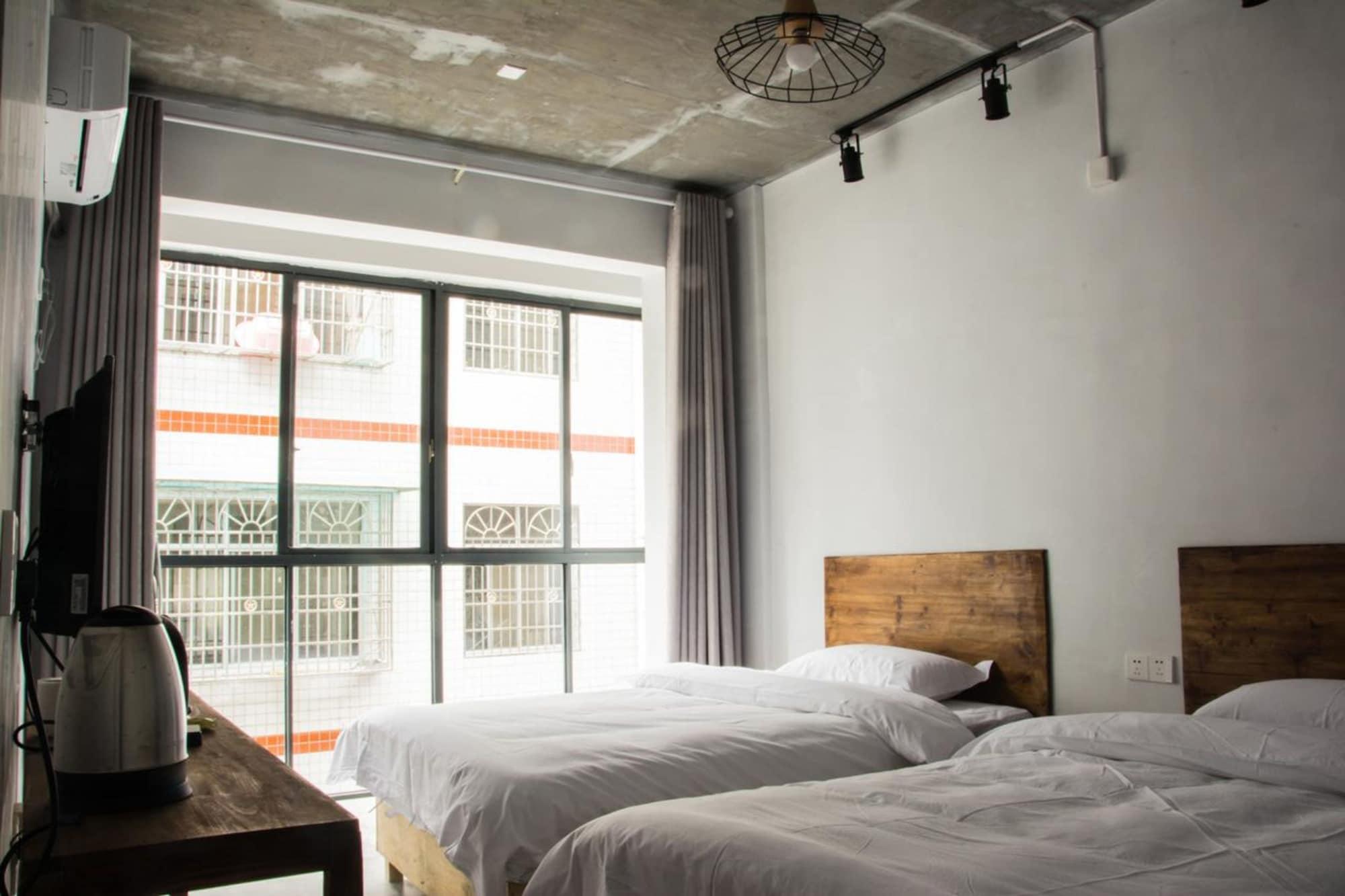 Hostel Geographer Zhangjiajie Buitenkant foto