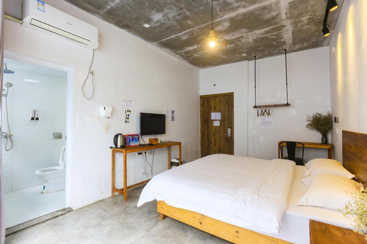 Hostel Geographer Zhangjiajie Buitenkant foto